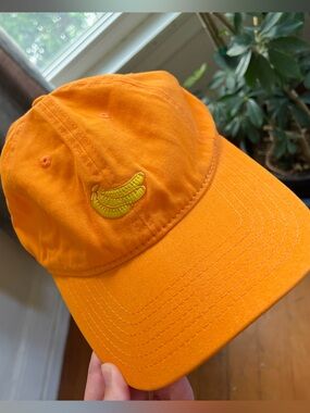 Ole Henriksen Orange Baseball Hat with Banana Patch